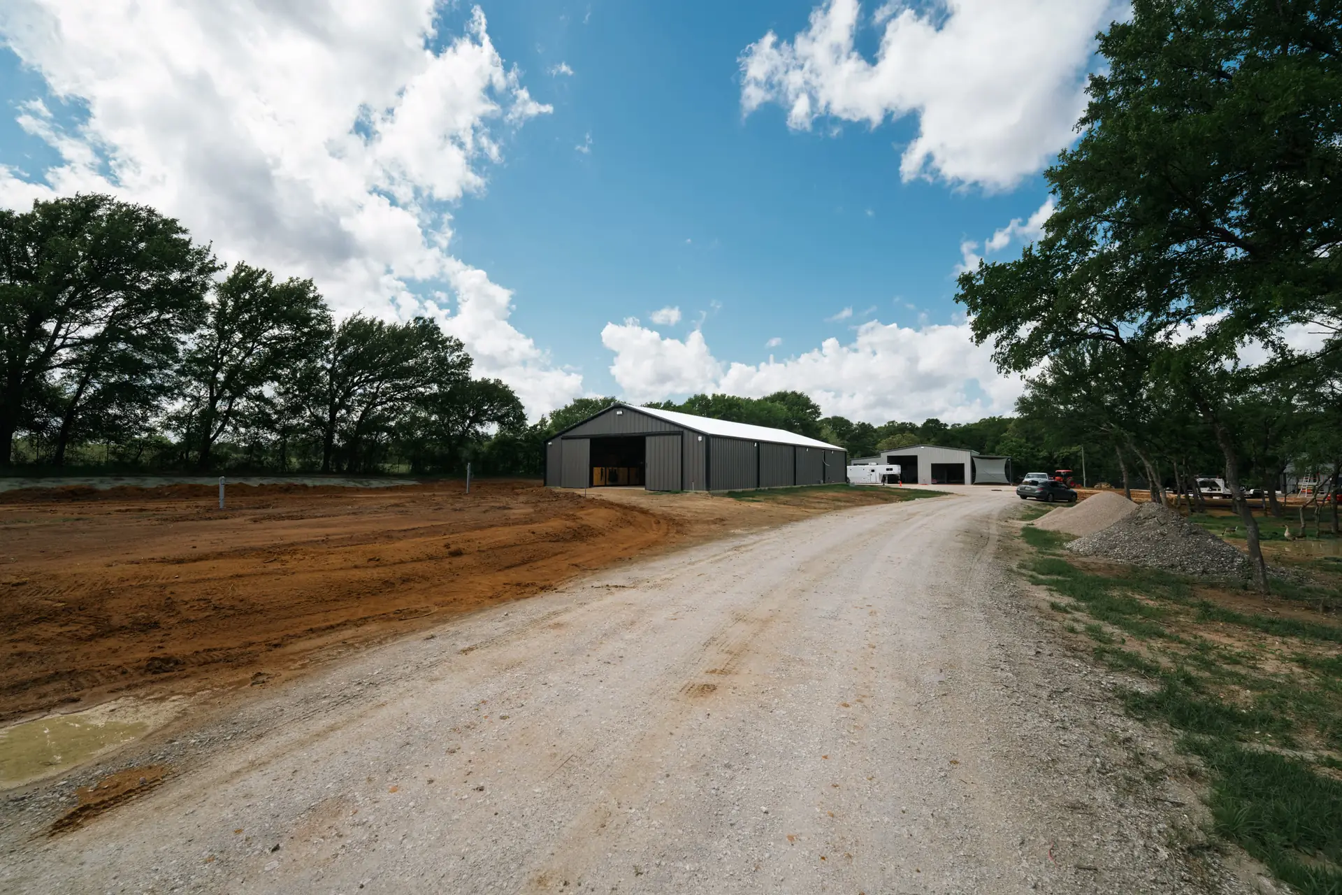 Private road construction rural land development Burleson Texas TNT Builders